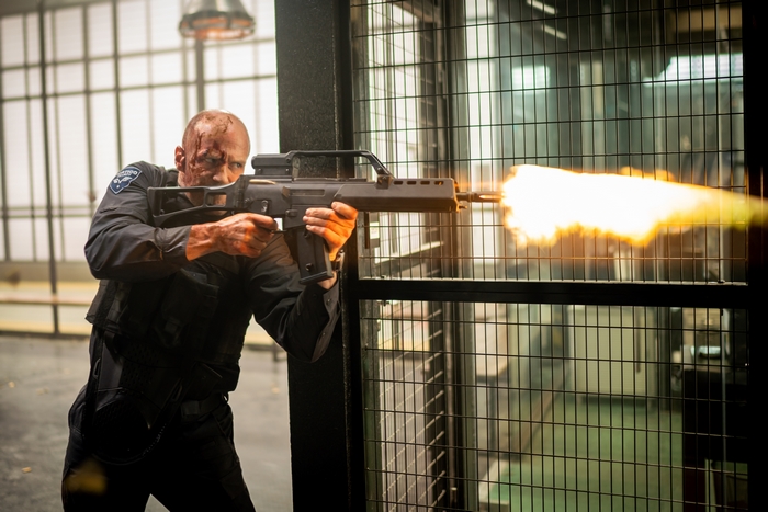 Wrath of Man Jason Statham firing gun