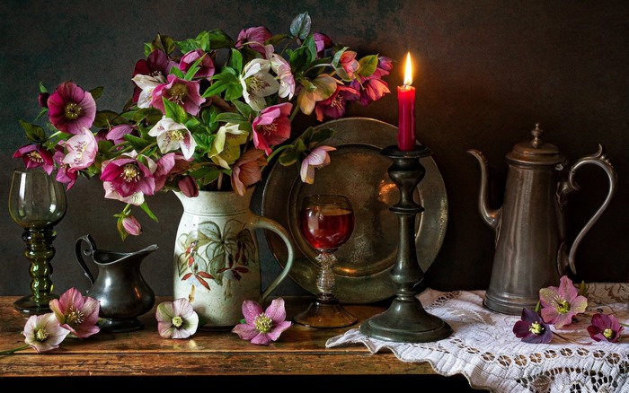 Still life with hellebores and candle