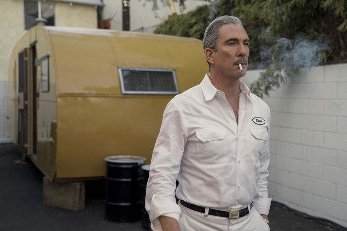 Dylan McDermott as Ernie West smoking