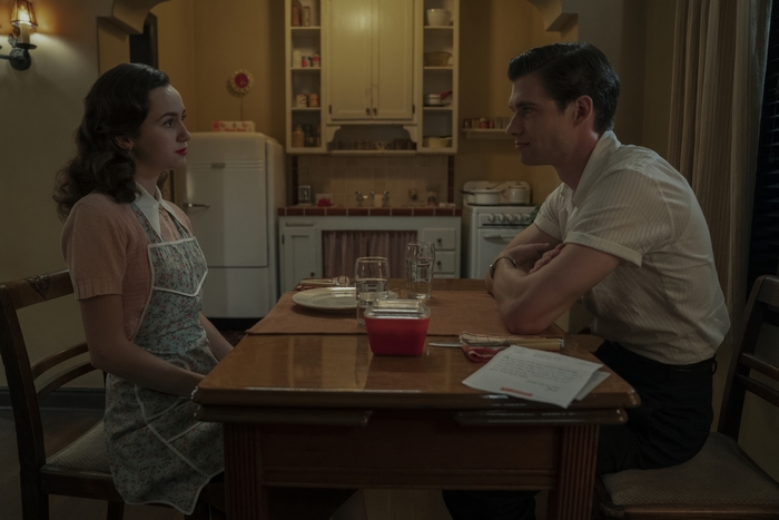 David Corenswet and a woman in a kitchen