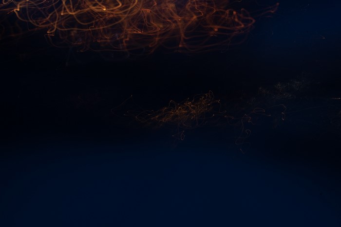 Abstract light trails on dark background