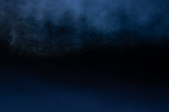 Abstract dark blue smoke texture