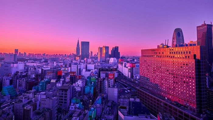 Cityscape at Sunset with Modern Buildings
