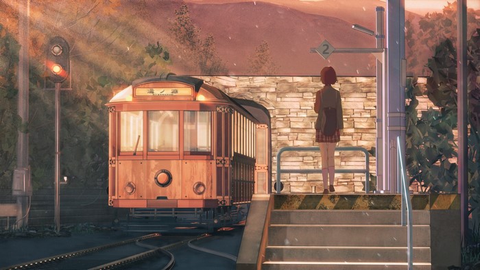 Girl waiting for a tram at a station