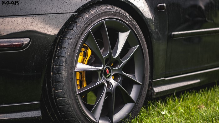 4K Saab 9-3 Sport Sedan with yellow brakes and custom rims