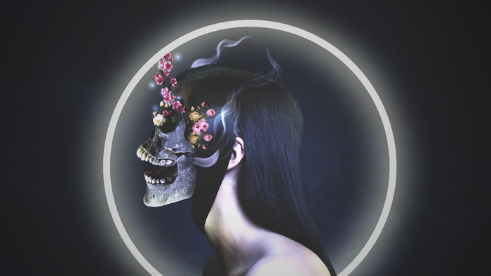 Skull with flowers and smoke inside a circle