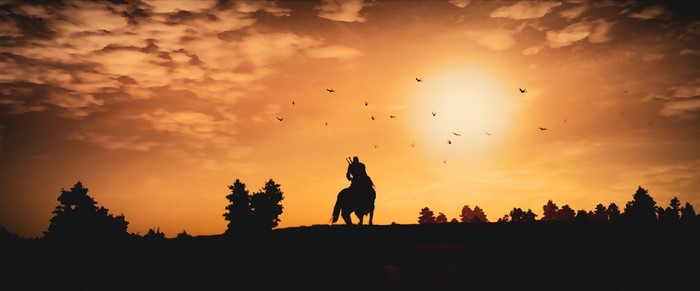 Geralt on horseback at sunset in The Witcher 3