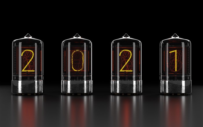 2021 displayed on Nixie tubes with reflection