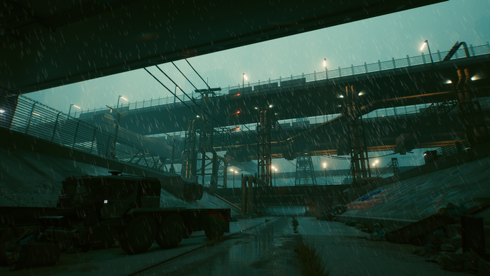 Cyberpunk 2077 screenshot of a rainy industrial area