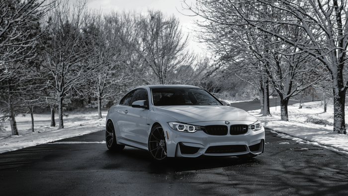 White BMW 4 Series in Snow