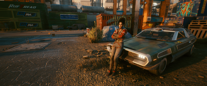 Panam Palmer from Cyberpunk 2077 leaning on a car