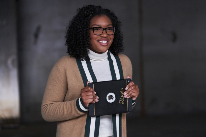 Taylor Mosby holding an iPad