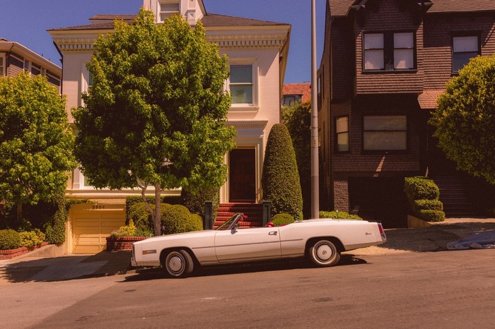 White convertible car parked on a street in San Francisco