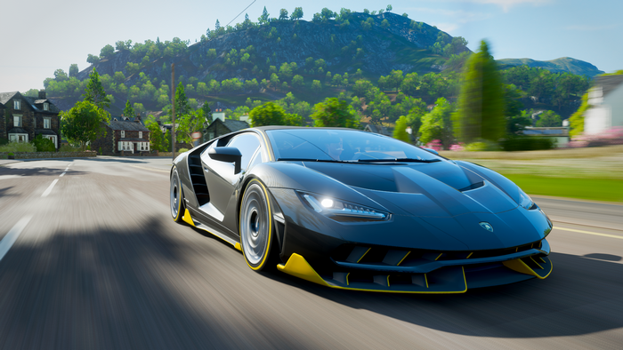 Black Lamborghini Centenario driving on a road in Forza Horizon 4