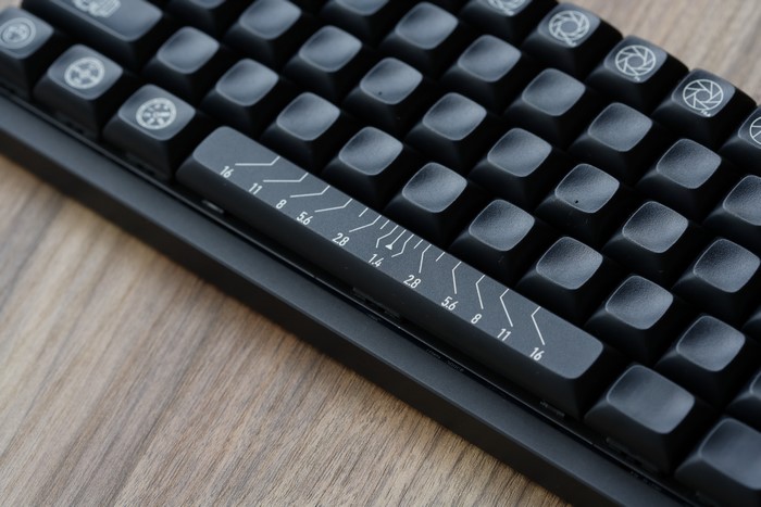 Close-up of a black mechanical keyboard with custom keycaps