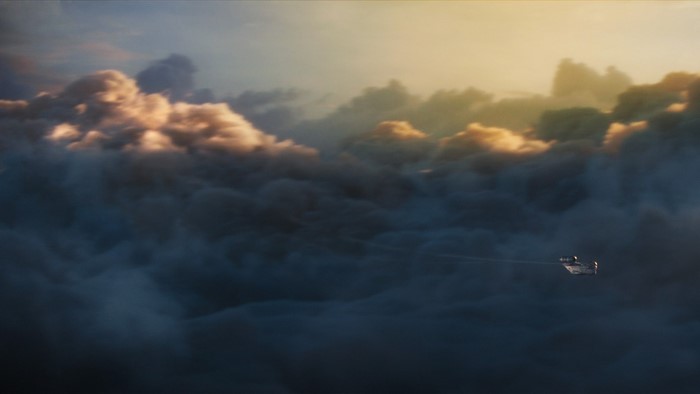 The Mandalorian spaceship flying through clouds