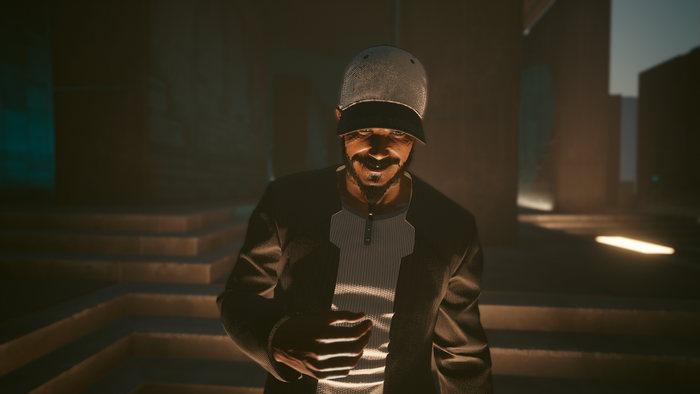 Man in a cap and jacket in Cyberpunk 2077
