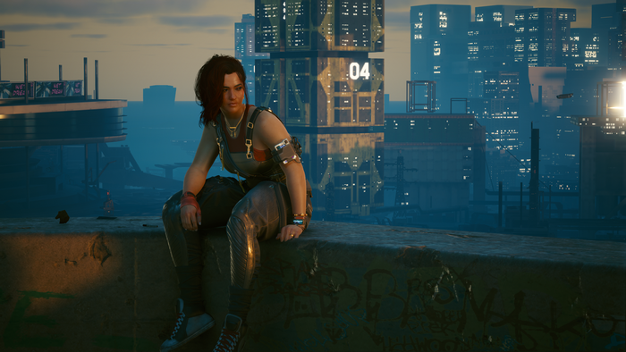 Woman in overalls sitting on a ledge in Cyberpunk 2077