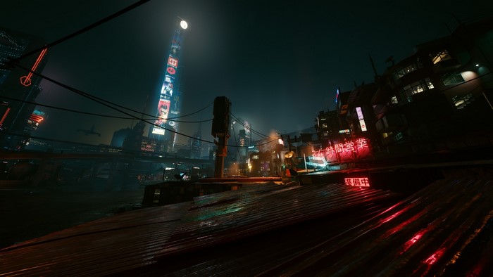 Cyberpunk 2077 night city skyline with neon signs