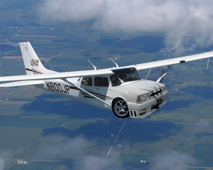 Cessna Skyhawk airplane with car front