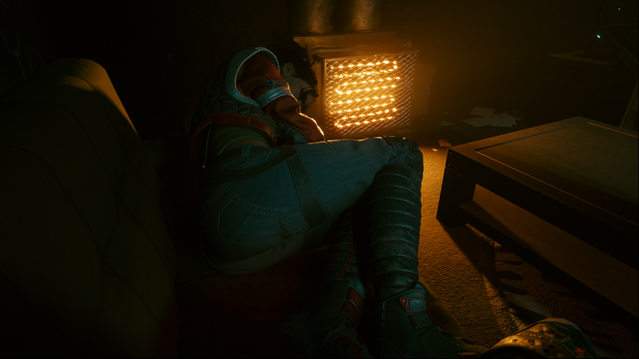 Cyberpunk 2077 screenshot of a person resting