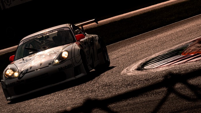 Porsche 911 GT3 race car on a track
