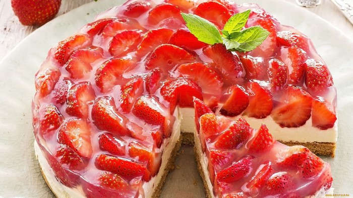Strawberry cake with a slice removed