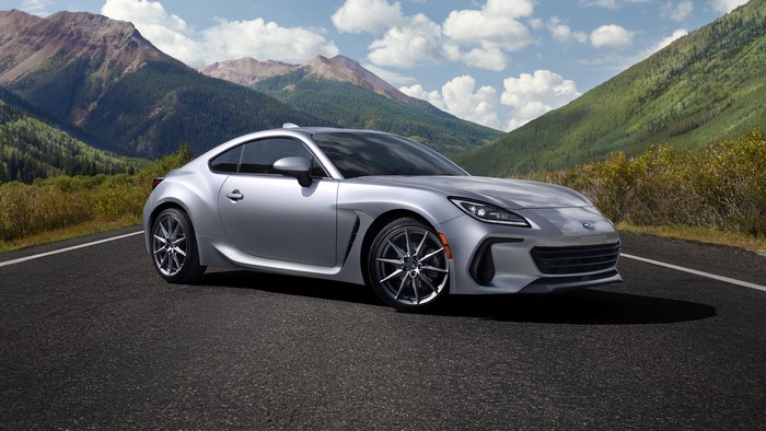 Silver Subaru BRZ sports car on a mountain road