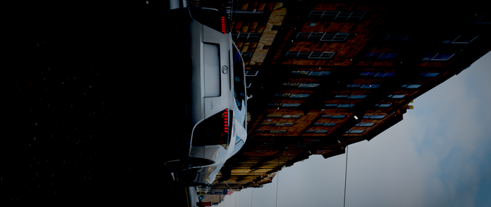 Car parked on a street with buildings