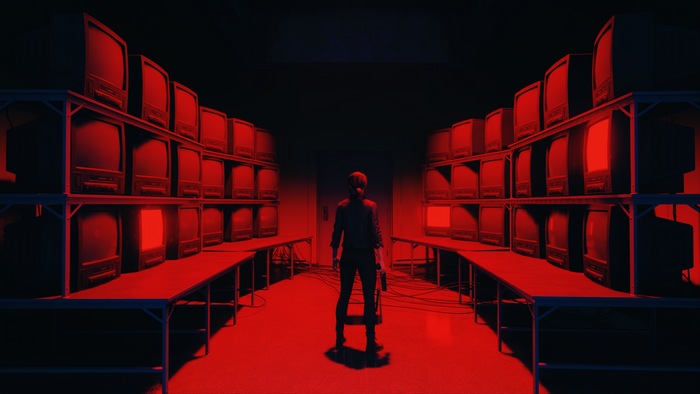 Jesse Faden in a room full of televisions in Control