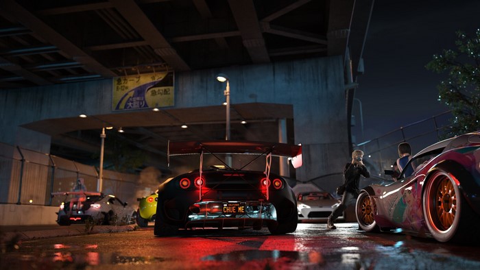 Lotus Exige and Toyota 86 at night under a bridge