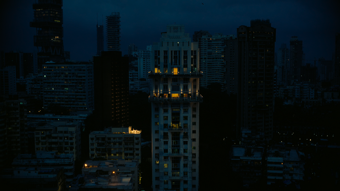 Christopher Nolan Tenet city night skyscraper