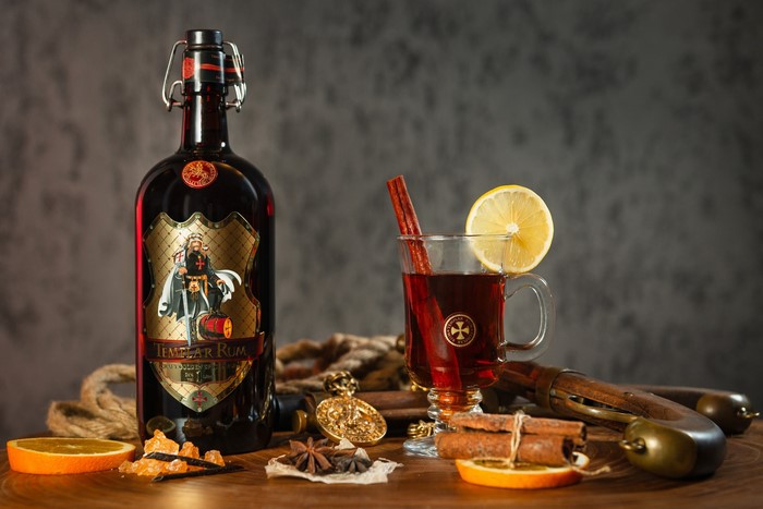 Templar Rum bottle and mulled drink with spices