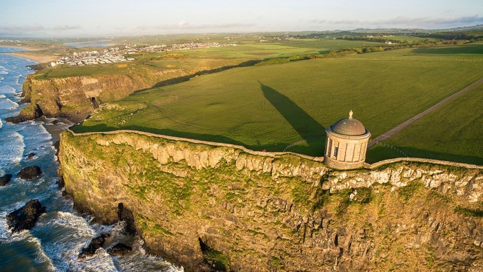 Mussenden Temple on a cliff overlooking the sea in Northern Ireland