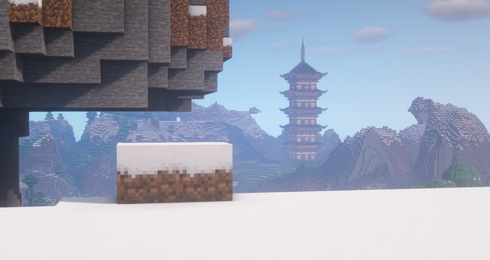 Minecraft Japanese pagoda in a snowy mountain landscape