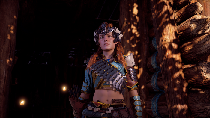 Aloy from Horizon Zero Dawn in a wooden structure
