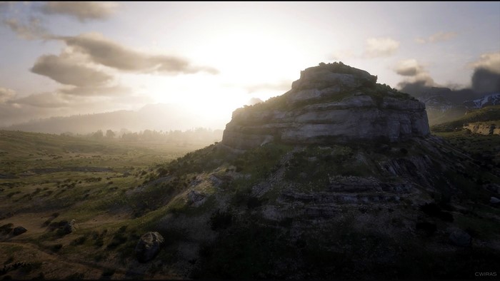 Red Dead Redemption 2 landscape with mountains and rock formations