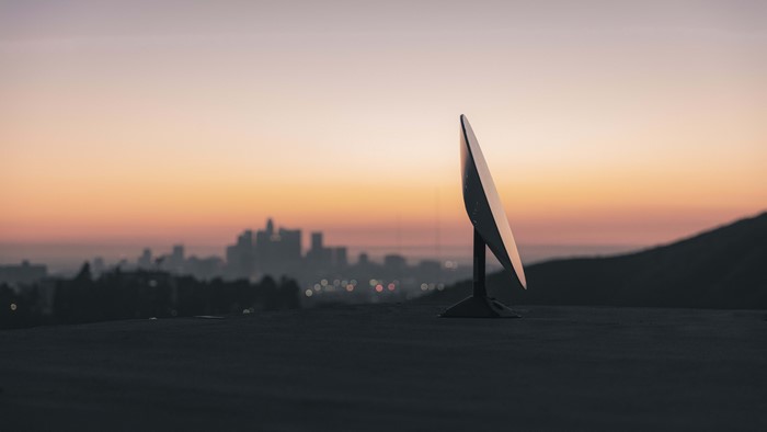 Starlink satellite dish overlooking Los Angeles at sunset