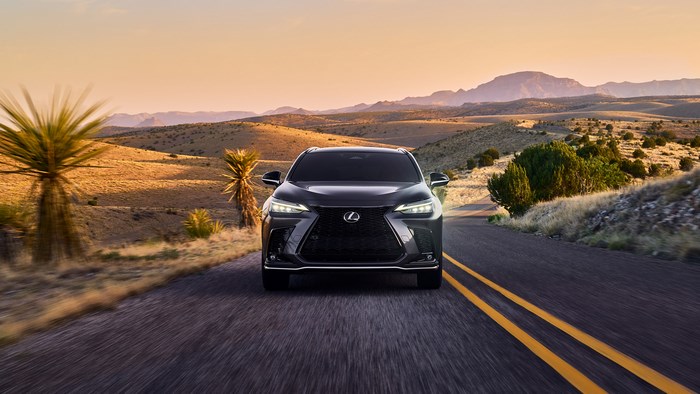 2022 Lexus NX F Sport driving on a desert road