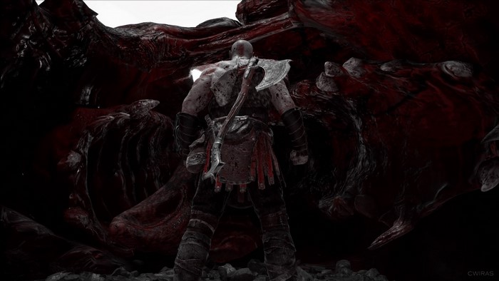 Kratos from God of War facing a large creature