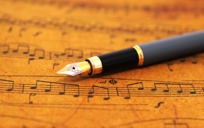 Fountain pen on vintage sheet music