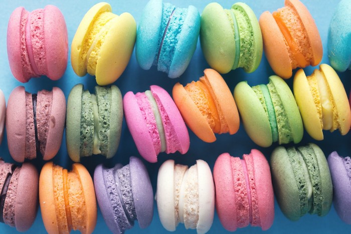 Colorful Macarons on a Blue Background