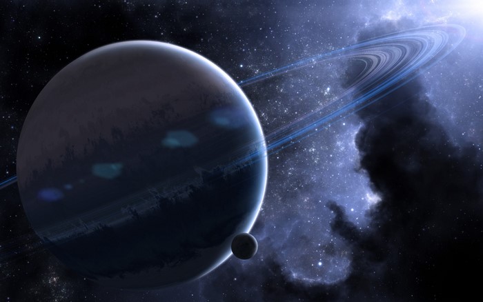 Planet with rings and moon in space