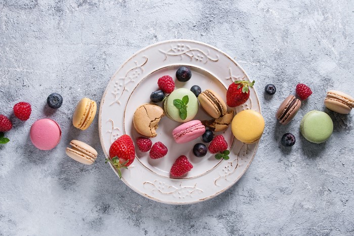 Colorful Macarons and Berries on a Plate