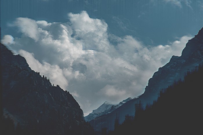 4K Glitch Art Mountains and Clouds