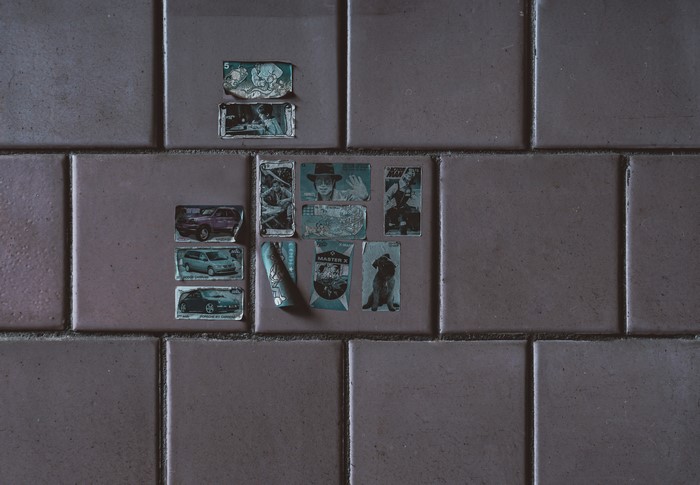 Stickers on a tiled wall