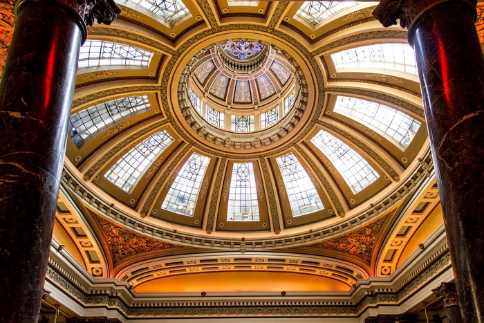 Interior of a grand dome with ornate architecture