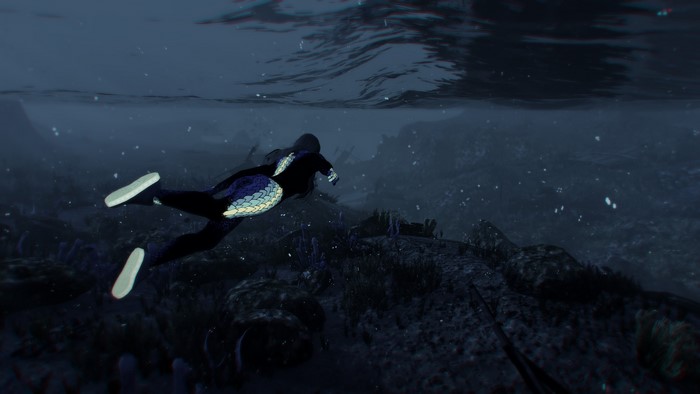 Woman in wetsuit swimming underwater in Grand Theft Auto V