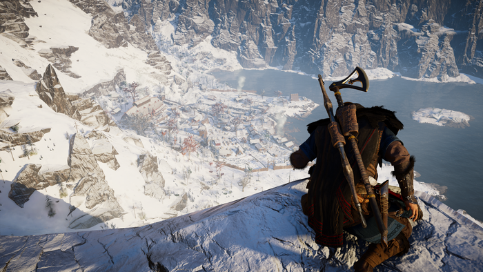 Eivor overlooking a snowy village and fjord
