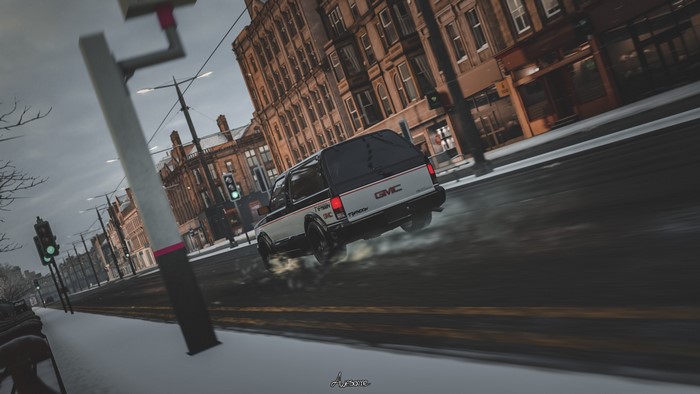 GMC Typhoon drifting on a snowy street in Forza Horizon 4